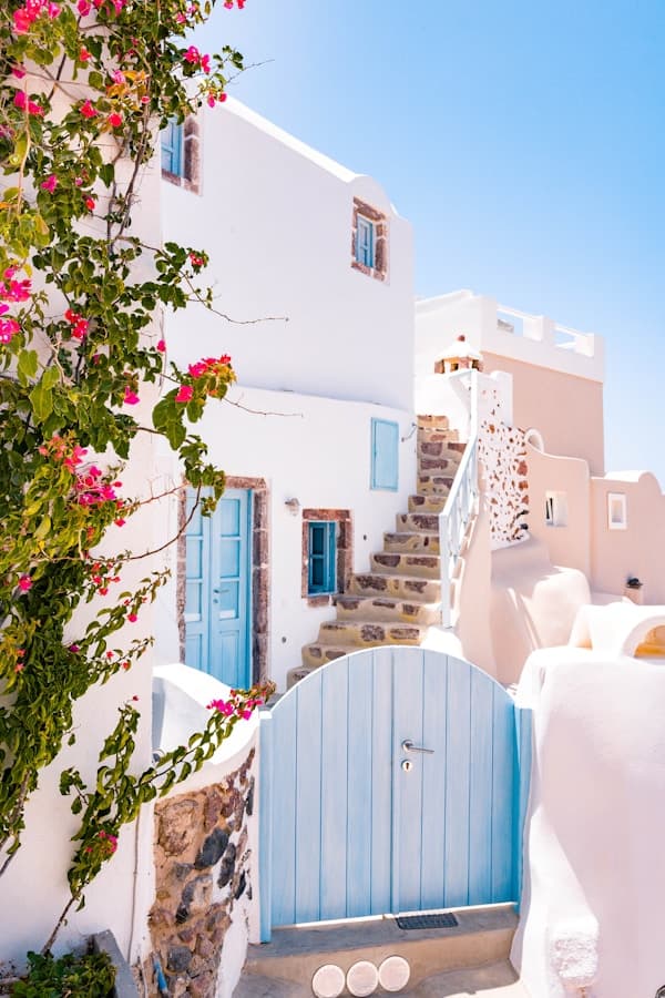 Santorini caldera view with whitewashed buildings and blue domes